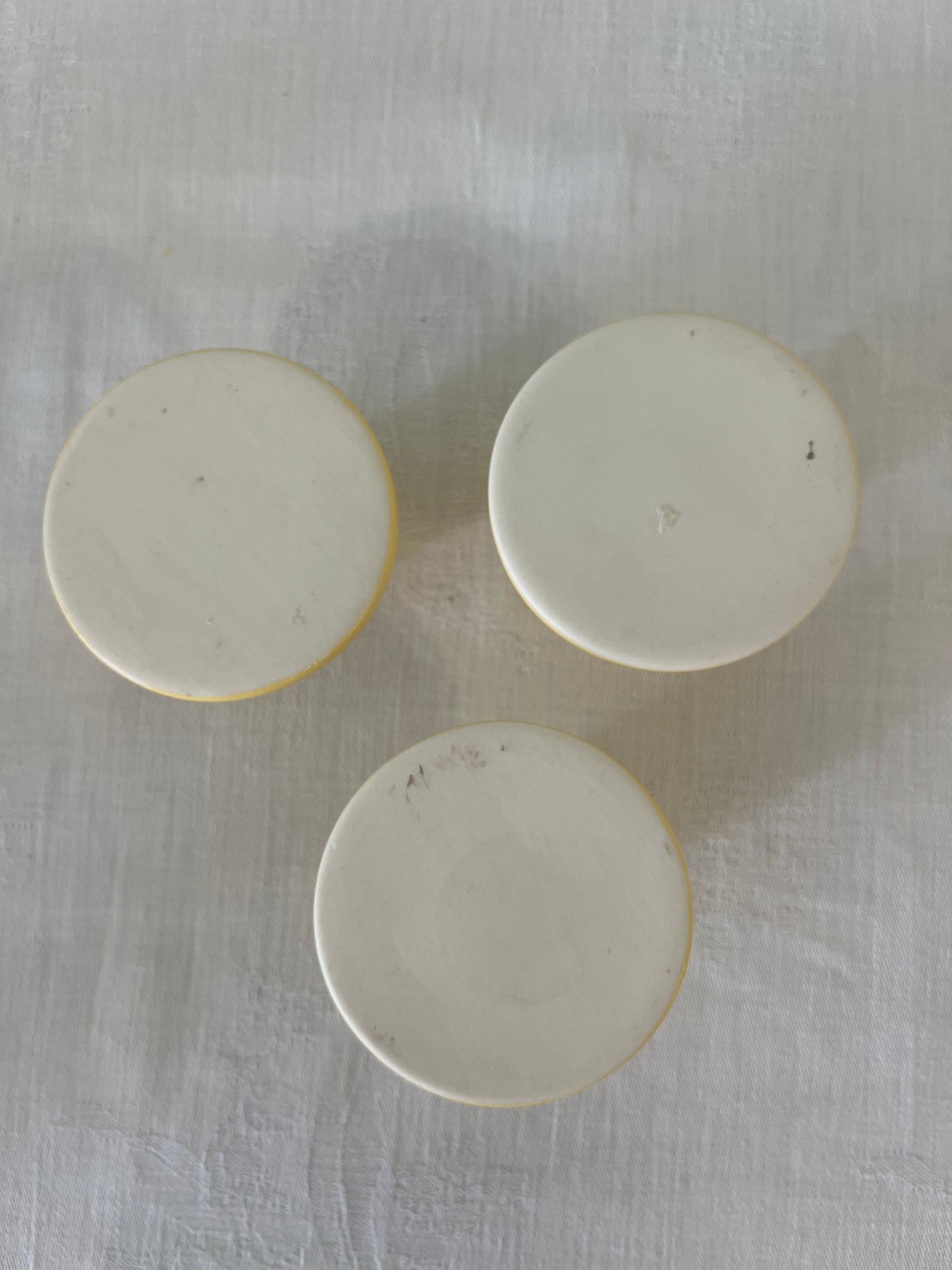 Yellow ceramic candle holders