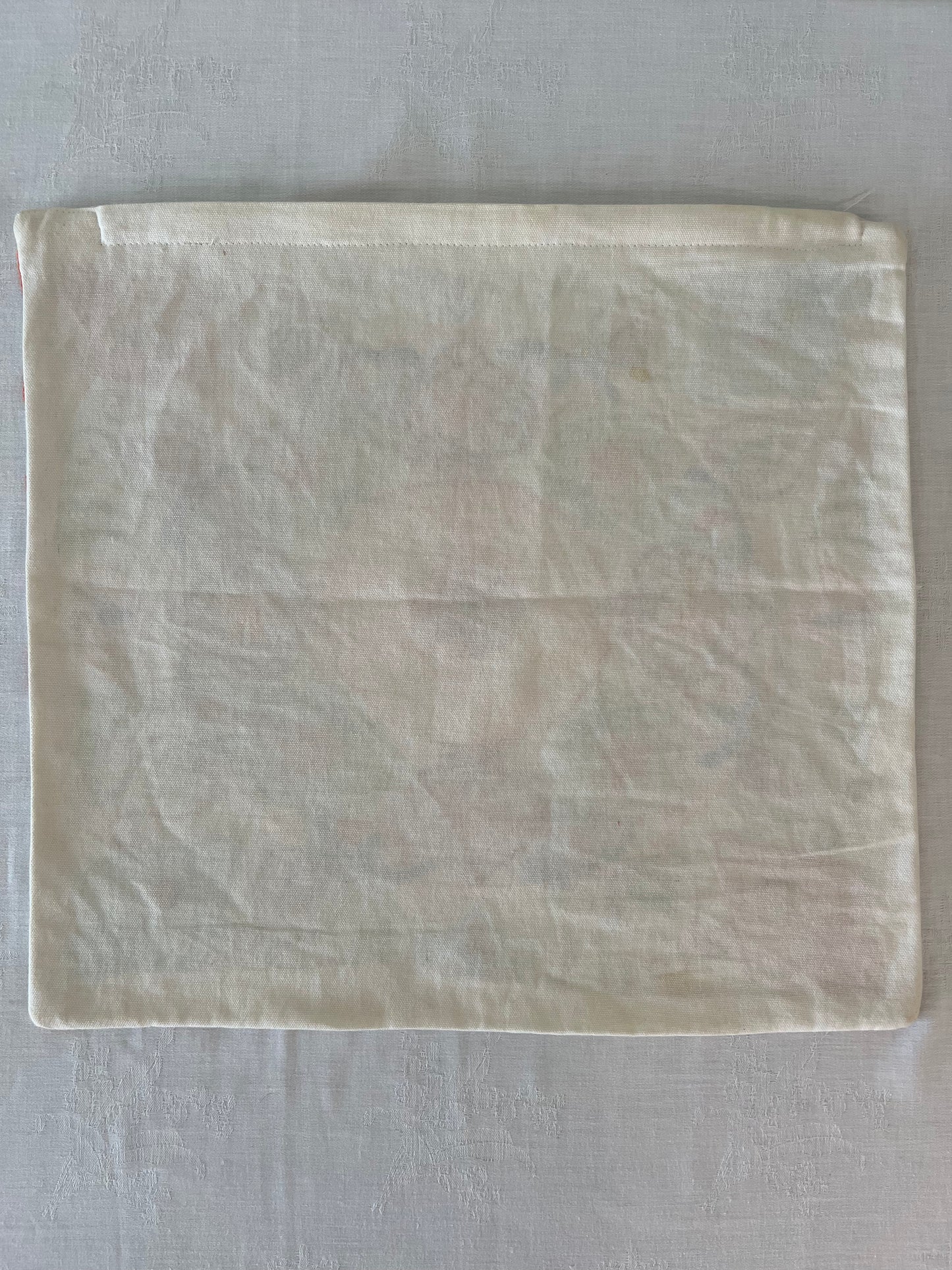 Embroidered cushion cover