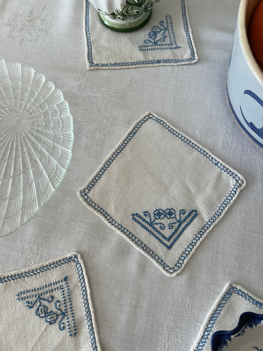 Hand embroided drinks mats