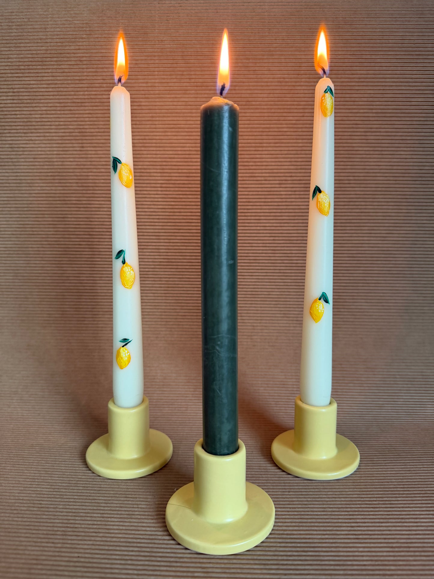 Yellow ceramic candle holders