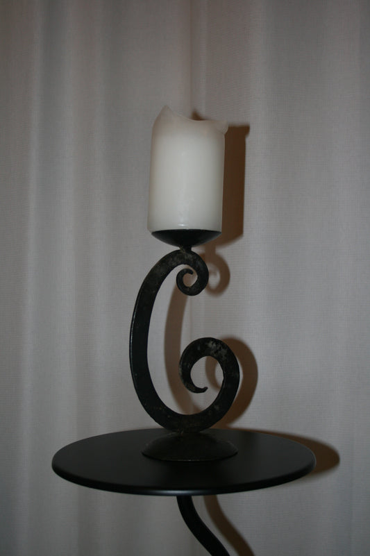 Iron swirl candle holder