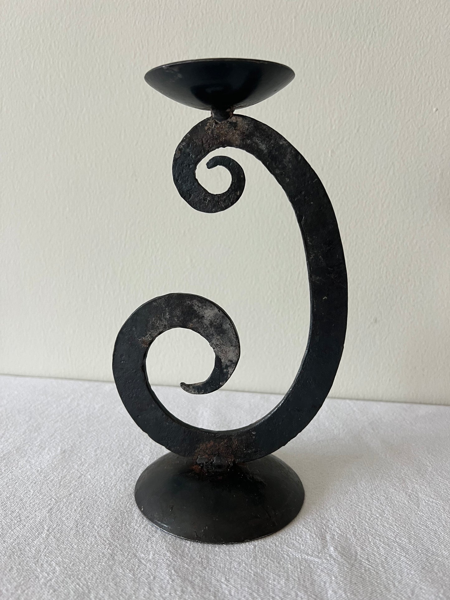 Iron swirl candle holder
