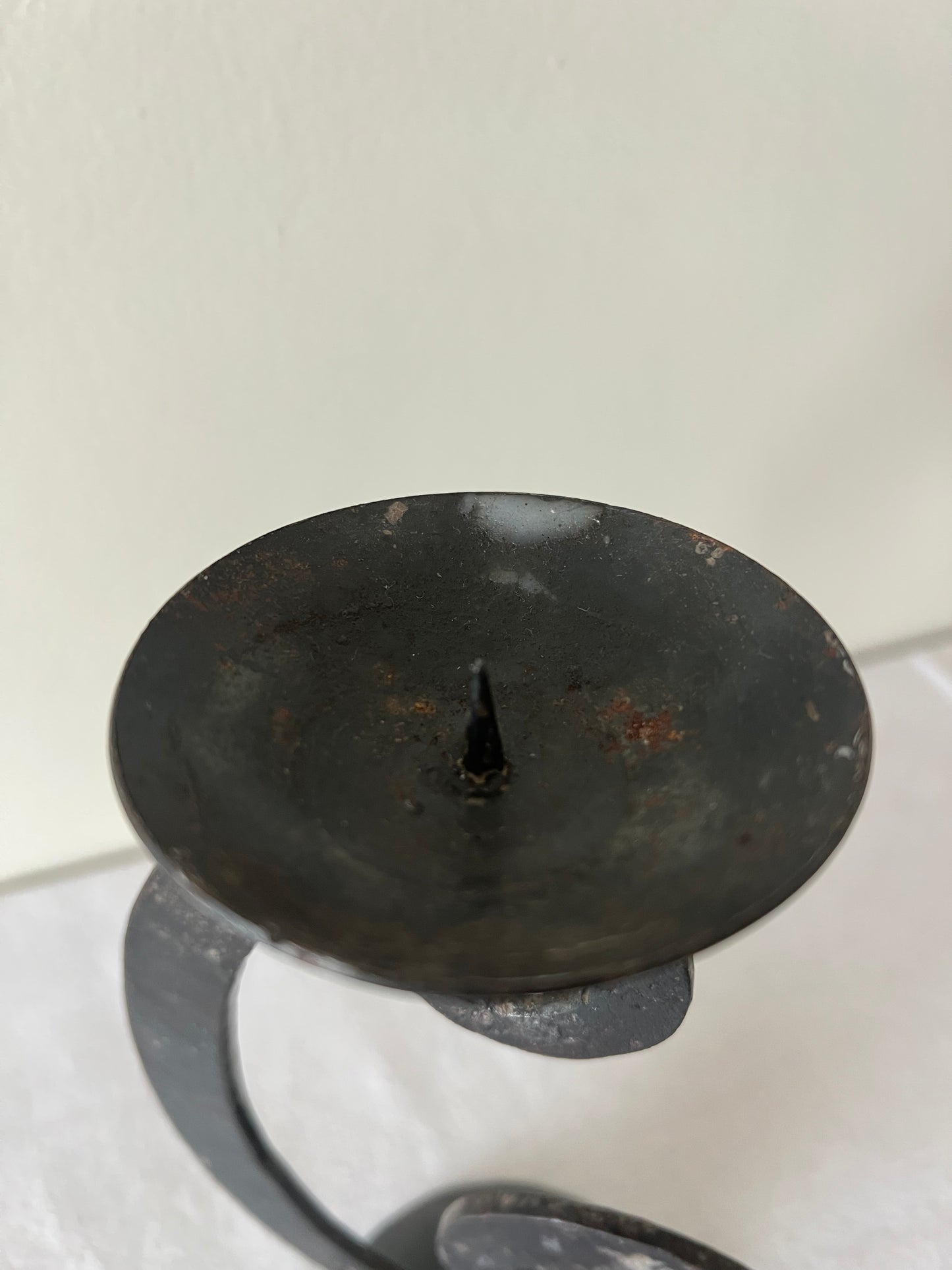 Iron swirl candle holder
