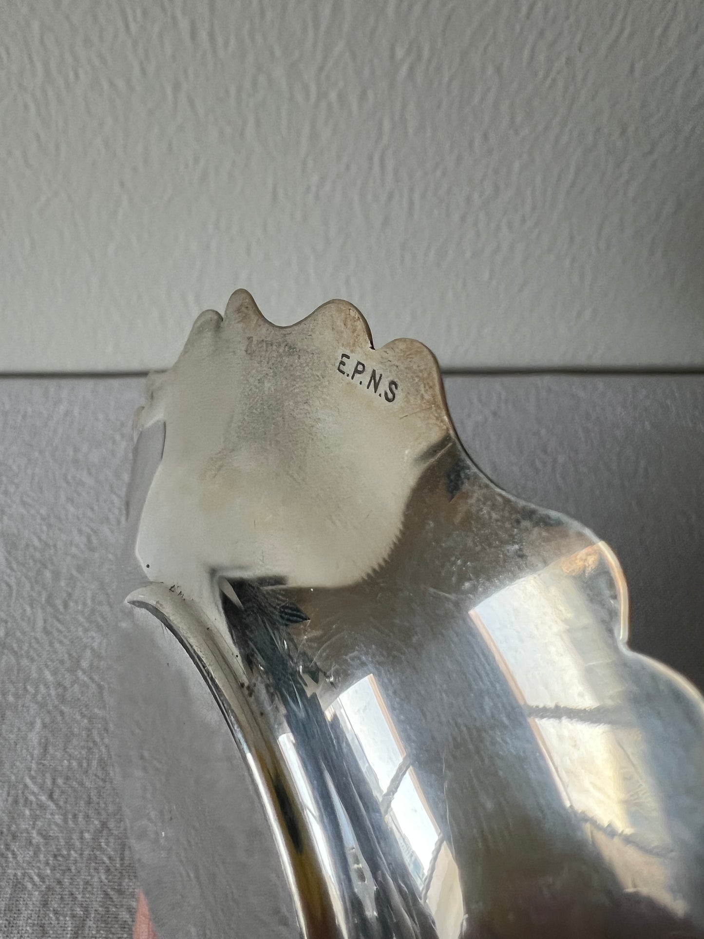 Silver plated egg cup and saucer
